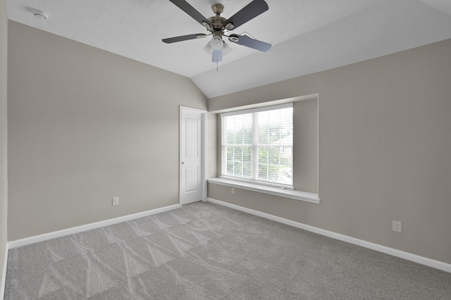 30507 Woodson Trace Dr, Spring, TX 77386 - unfurnished room featuring baseboards, light carpet, lofted ceiling, a ceiling fan, and a smoke detector