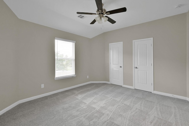 30507 Woodson Trace Dr, Spring, TX 77386 - unfurnished bedroom with light colored carpet, baseboards, lofted ceiling, and a ceiling fan