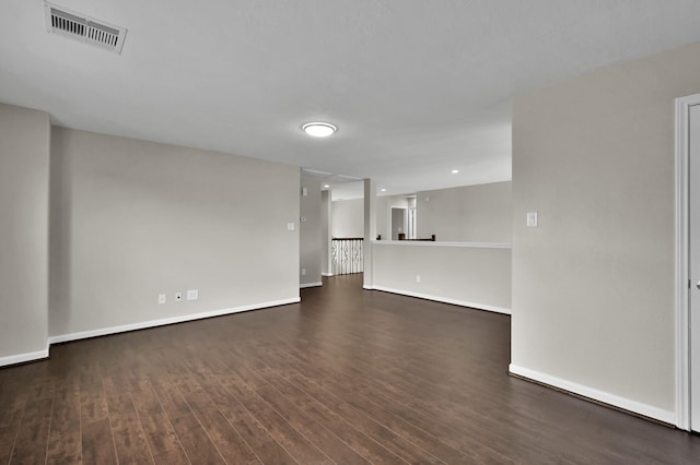 30507 Woodson Trace Dr, Spring, TX 77386 - unfurnished living room featuring baseboards and wood finished floors
