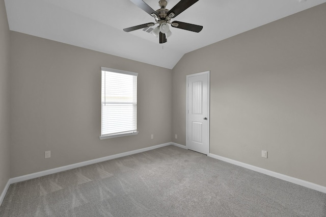 30507 Woodson Trace Dr, Spring, TX 77386 - spare room featuring carpet floors, baseboards, a ceiling fan, and lofted ceiling