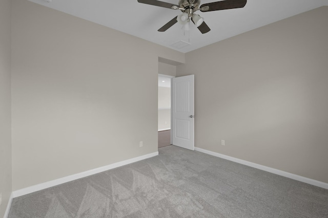 30507 Woodson Trace Dr, Spring, TX 77386 - unfurnished room with carpet, baseboards, and a ceiling fan