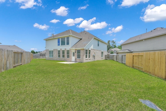 30507 Woodson Trace Dr, Spring, TX 77386 - rear view of property with brick siding and a shingled roof