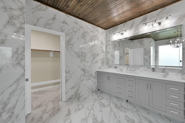 30507 Woodson Trace Dr, Spring, TX 77386 - full bath featuring double vanity, marble finish flooring, wooden ceiling, a spacious closet, and a chandelier