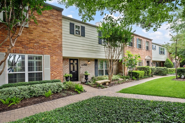 5859 Doliver Dr Unit 14, Houston, TX 77057 - townhome / multi-family property with a front lawn and brick siding
