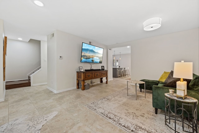 5859 Doliver Dr Unit 14, Houston, TX 77057 - living area with stairs, tile patterned flooring, baseboards, and recessed lighting