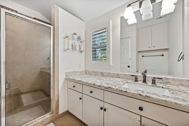 5859 Doliver Dr Unit 14, Houston, TX 77057 - full bathroom featuring vanity, a stall shower, and vaulted ceiling