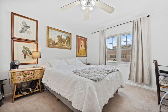 5859 Doliver Dr Unit 14, Houston, TX 77057 - bedroom with light carpet and a ceiling fan