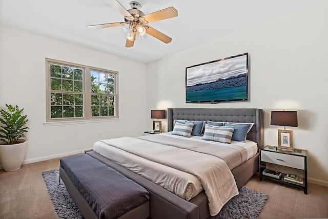 5859 Doliver Dr Unit 14, Houston, TX 77057 - bedroom featuring light colored carpet, baseboards, and a ceiling fan