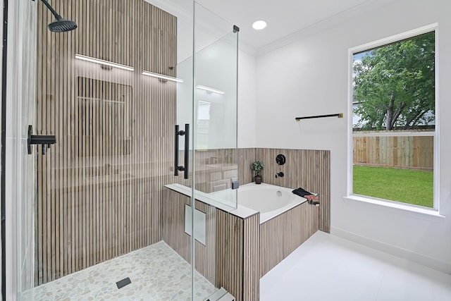 2918 Linda Dr, Pearland, TX 77584 - bathroom featuring a shower stall, a garden tub, and crown molding