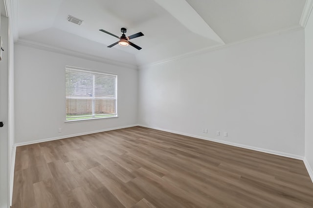 2918 Linda Dr, Pearland, TX 77584 - unfurnished room with a tray ceiling, wood finished floors, ornamental molding, ceiling fan, and baseboards