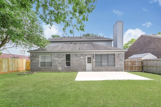 2918 Linda Dr, Pearland, TX 77584 - back of house with a patio, brick siding, a shingled roof, and a chimney