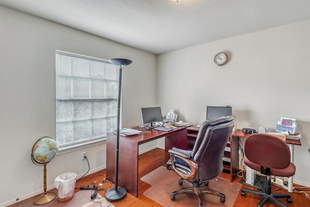 23207 Greenrush Dr, Katy, TX 77494 - home office featuring wood finished floors and baseboards