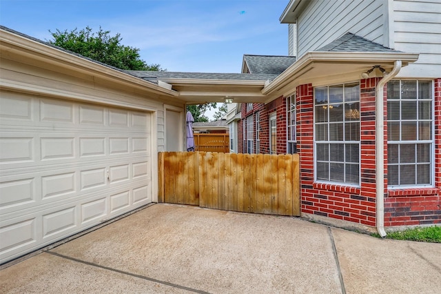 23207 Greenrush Dr, Katy, TX 77494 - view of property exterior with roof with shingles, brick siding, concrete driveway, and an attached garage