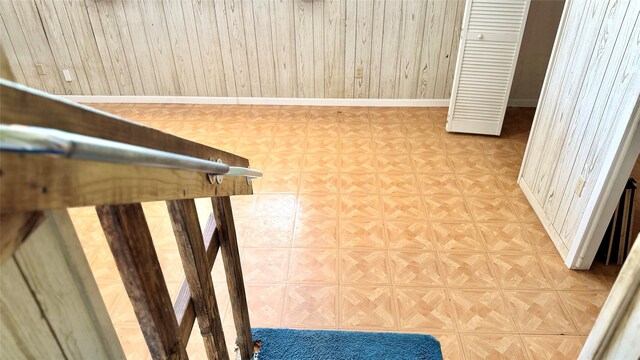 430 Hooks Rd, Livingston, TX 77351 - staircase with wooden walls