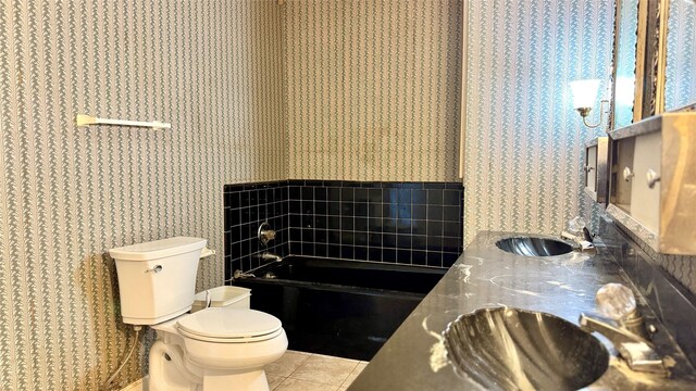 430 Hooks Rd, Livingston, TX 77351 - full bath with a garden tub, wallpapered walls, tile patterned flooring, and double vanity