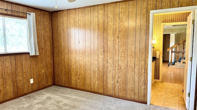 430 Hooks Rd, Livingston, TX 77351 - unfurnished room with wooden walls and a ceiling fan