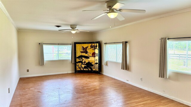 430 Hooks Rd, Livingston, TX 77351 - unfurnished room featuring a ceiling fan, wood finished floors, and crown molding