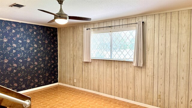430 Hooks Rd, Livingston, TX 77351 - empty room featuring a ceiling fan and a textured ceiling