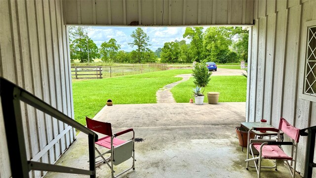 430 Hooks Rd, Livingston, TX 77351 - view of patio / terrace with view of wooded area
