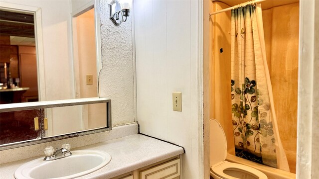 430 Hooks Rd, Livingston, TX 77351 - full bathroom featuring vanity and shower / tub combo
