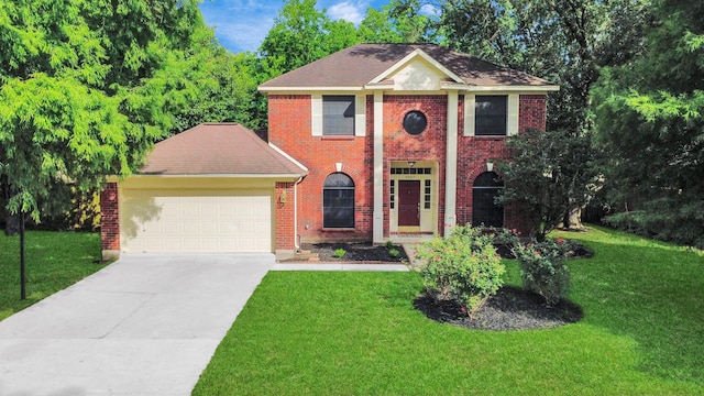 4907 Heritage Plains Dr, Friendswood, TX 77546 - view of front facade with an attached garage, a front lawn, and driveway