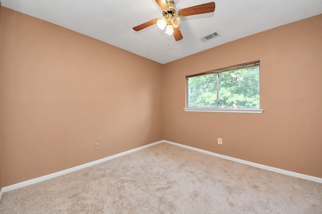 4907 Heritage Plains Dr, Friendswood, TX 77546 - spare room featuring carpet flooring, baseboards, and a ceiling fan