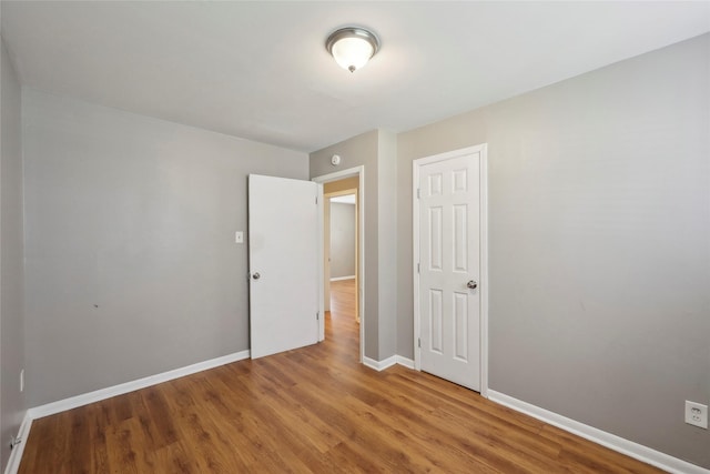 9270 Mclean St, Beaumont, TX 77707 - spare room featuring wood finished floors and baseboards