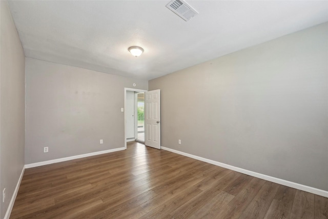 9270 Mclean St, Beaumont, TX 77707 - spare room featuring wood finished floors and baseboards