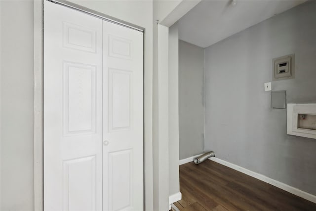 9270 Mclean St, Beaumont, TX 77707 - laundry area featuring baseboards, dark wood-type flooring, and washer hookup