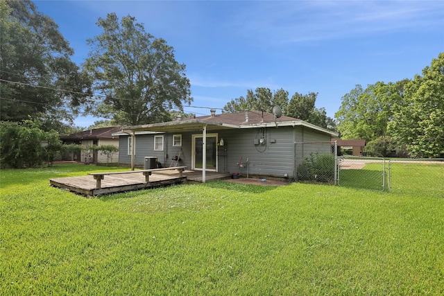 9270 Mclean St, Beaumont, TX 77707 - back of house featuring a wooden deck