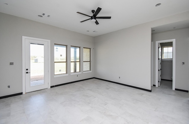 208 Silverleaf Rd, Sweeny, TX 77480 - unfurnished room with ceiling fan, baseboards, and light floors