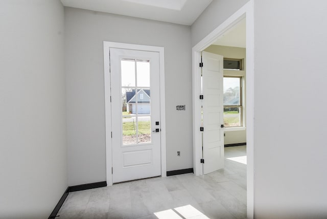 208 Silverleaf Rd, Sweeny, TX 77480 - entryway with baseboards and light marble finish floors