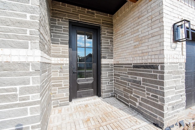 208 Silverleaf Rd, Sweeny, TX 77480 - doorway to property with brick siding