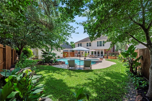 7818 Palm Brook Ct, Houston, TX 77095 - rear view of property with a patio