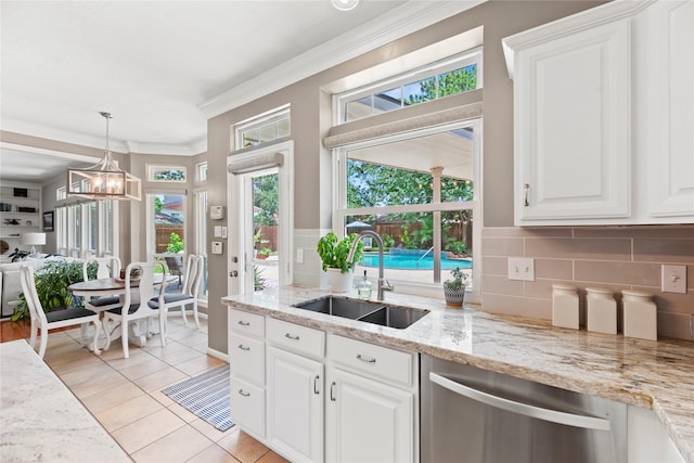 7818 Palm Brook Ct, Houston, TX 77095 - kitchen featuring stainless steel dishwasher, a sink, decorative backsplash, white cabinets, and crown molding