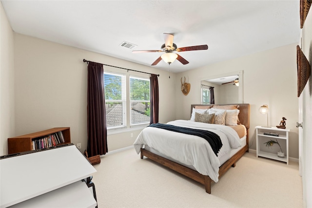 7818 Palm Brook Ct, Houston, TX 77095 - bedroom with light carpet, baseboards, and ceiling fan
