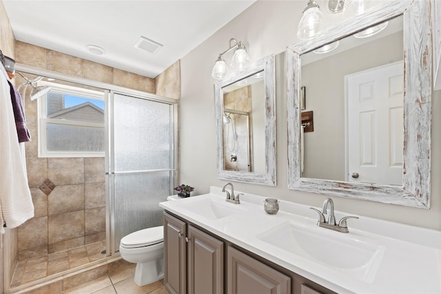 7818 Palm Brook Ct, Houston, TX 77095 - full bath featuring a shower stall, toilet, double vanity, and tile patterned floors