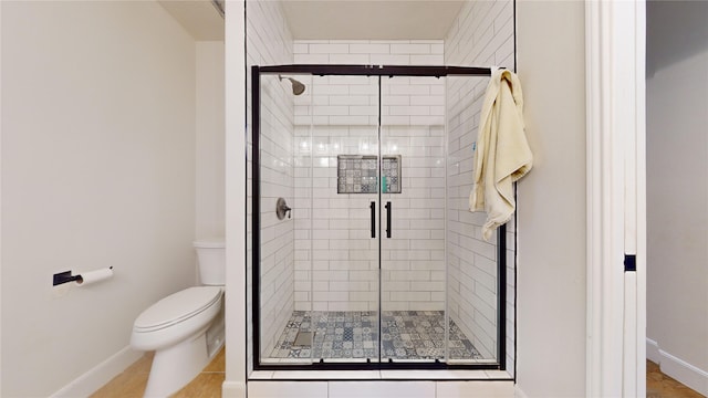 28511 E Benders Landing Blvd, Spring, TX 77386 - full bathroom featuring toilet, a shower stall, and baseboards
