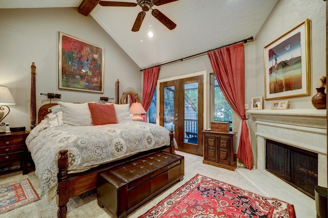 322 Sugarberry Cir, Houston, TX 77024 - bedroom featuring access to exterior, french doors, light carpet, a fireplace with raised hearth, and ceiling fan