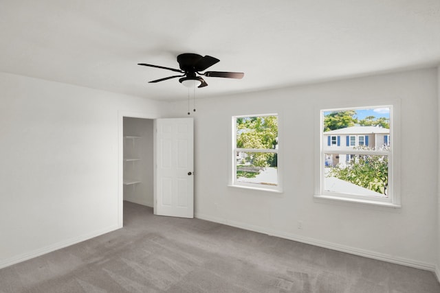 1101 2nd Ave N, Texas City, TX 77590 - carpeted spare room with a ceiling fan and baseboards