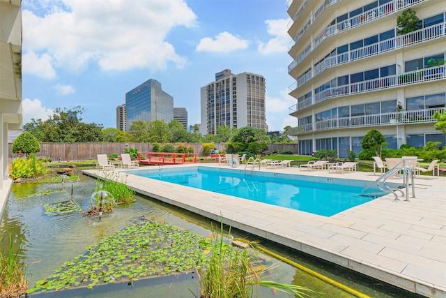 5050 Woodway Dr Unit 3M, Houston, TX 77056 - community pool with a patio