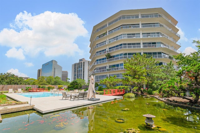 5050 Woodway Dr Unit 3M, Houston, TX 77056 - community pool featuring a city view