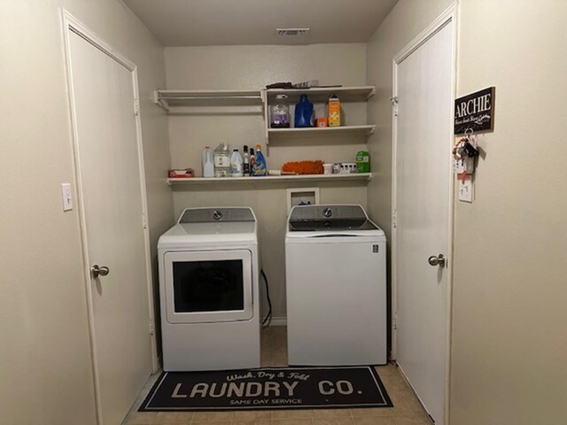 440 Maggie Cir, Flint, TX 75762 - washroom with independent washer and dryer and tile patterned floors