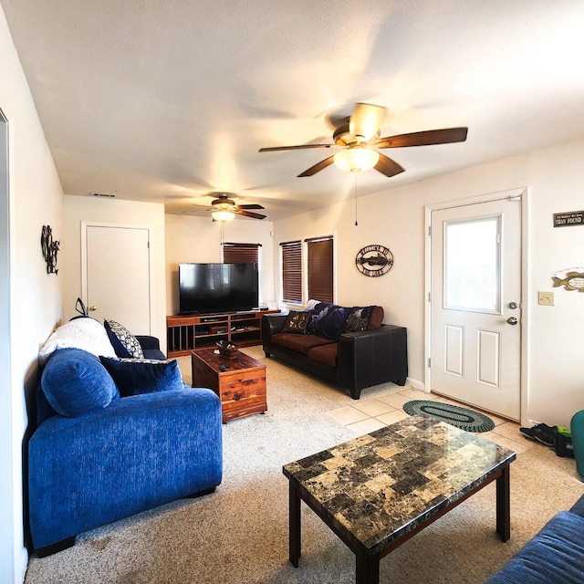 278 Shelter Cove Dr, Livingston, TX 77351 - living room featuring light carpet, ceiling fan, and baseboards