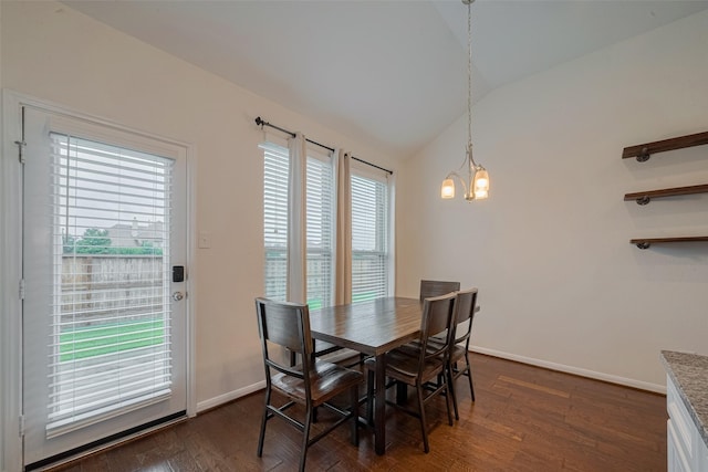 9715 Deborah Colony Ln, Humble, TX 77396 - dining room with lofted ceiling, a chandelier, dark wood-type flooring, and baseboards