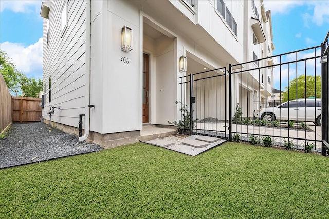 506 Parker St, Houston, TX 77007 - view of exterior entry with a gate