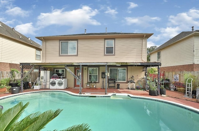 15133 Elstree Dr, Channelview, TX 77530 - rear view of property featuring washing machine and dryer and a patio area