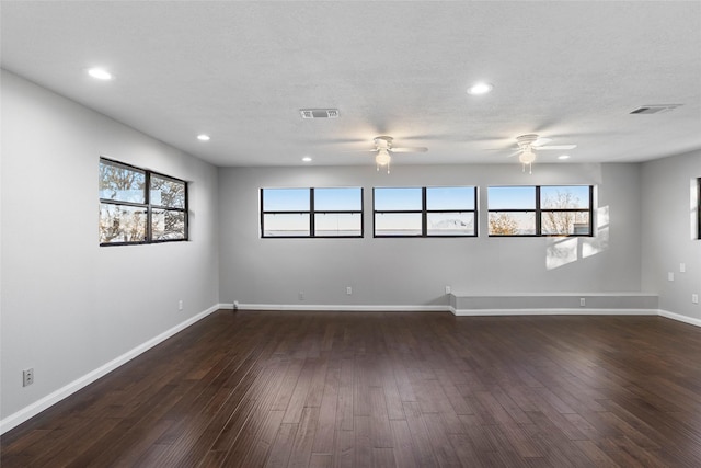283 Sam Loop, Houston Loop, Point Blank, TX 77364 - unfurnished room with a ceiling fan, dark wood-style flooring, baseboards, and recessed lighting