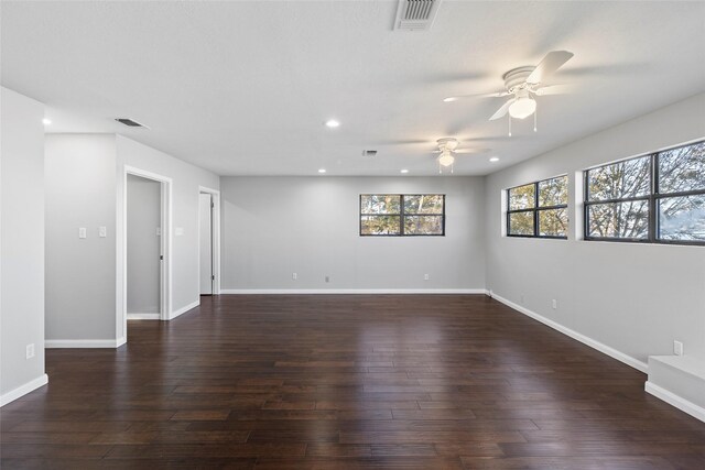 283 Sam Loop, Houston Loop, Point Blank, TX 77364 - spare room with a ceiling fan, recessed lighting, dark wood-style flooring, and baseboards