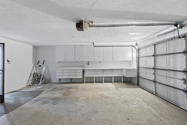 283 Sam Loop, Houston Loop, Point Blank, TX 77364 - garage featuring a garage door opener